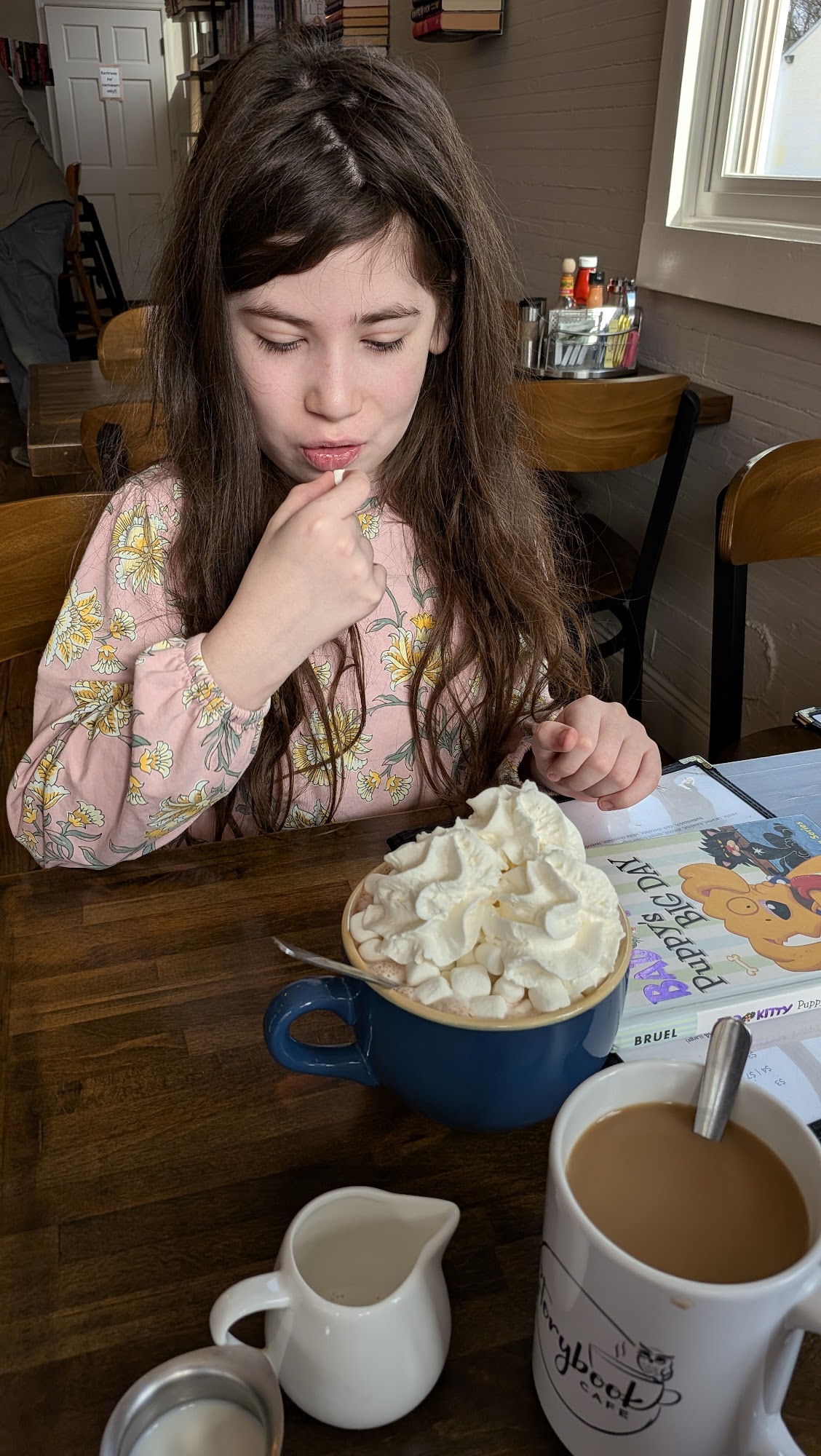 Friends enjoying a meal at a cafe
